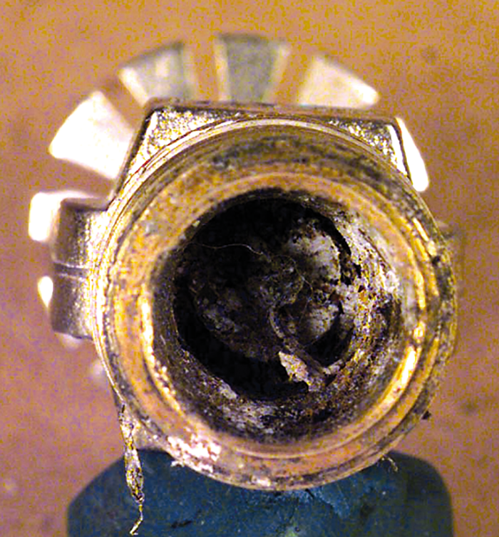 Figure 2: Photograph illustrating the level of deposits commonly found in sprinkler inlets.