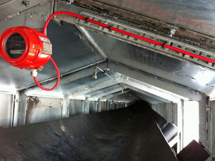 Talentum flame detector within the enclosed conveyor