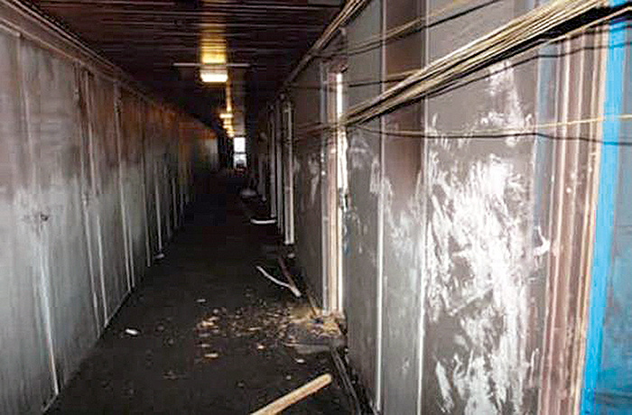 Hanging cables within the corridors of Shirley Towers following the fatal fire in 2010.