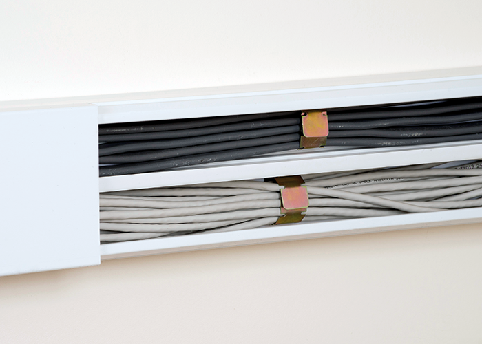 D-Line clips securing fire rated and utility cabling. Image courtesy of D-Line.