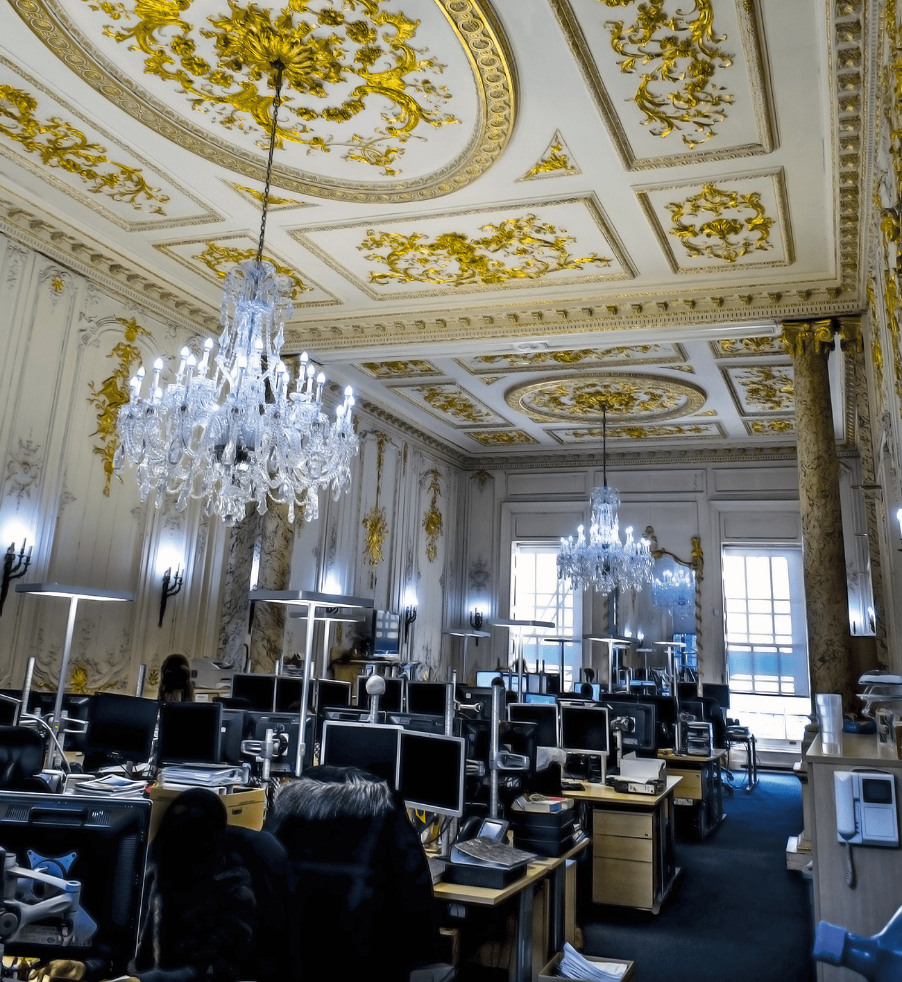 Historic ballroom transformed into a modern office.