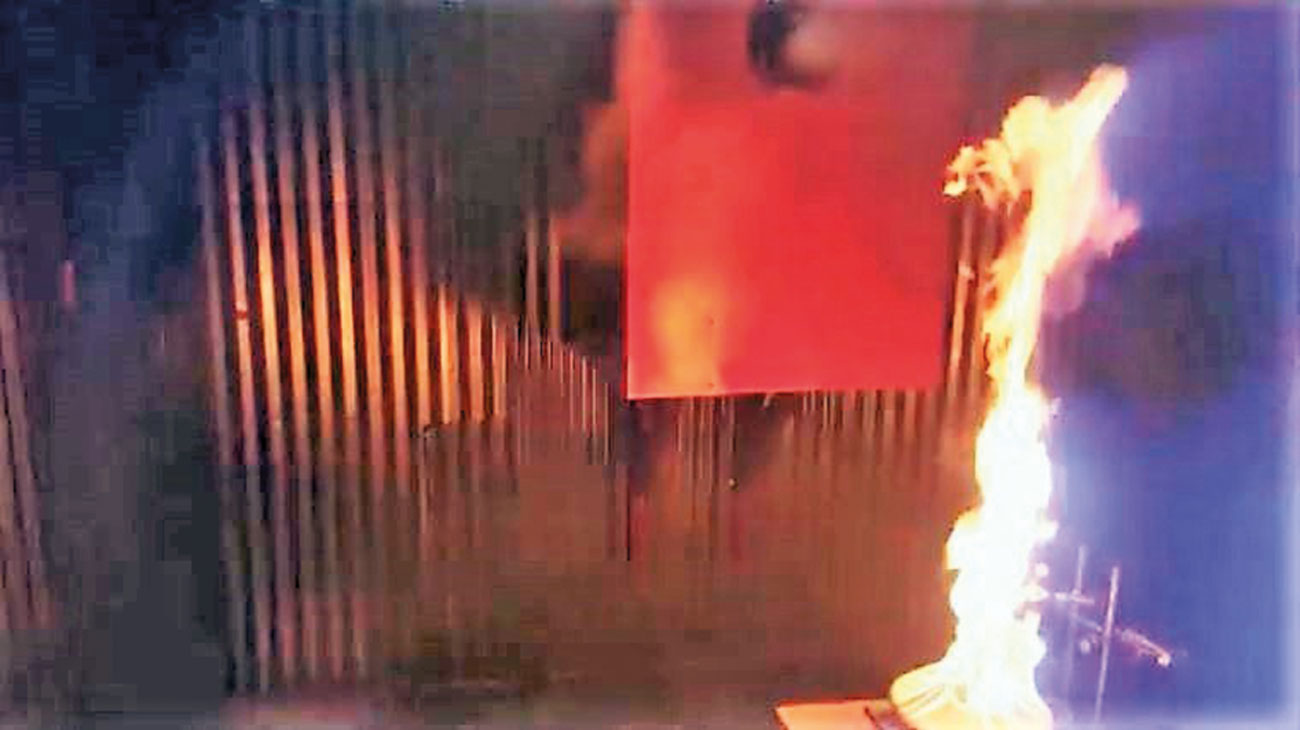 Figure 6: Heptane pool fire in the enclosure in total flooding at 300 psi nitrogen release pressure.
