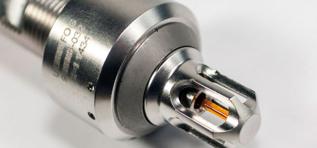 Ultra Fog Nozzle with Glass Bulb. When the nozzle is affected by the heat of the fire, the glass bulb will burst releasing the piston.