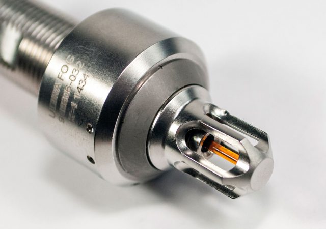 Ultra Fog Nozzle with Glass Bulb. When the nozzle is affected by the heat of the fire, the glass bulb will burst releasing the piston.