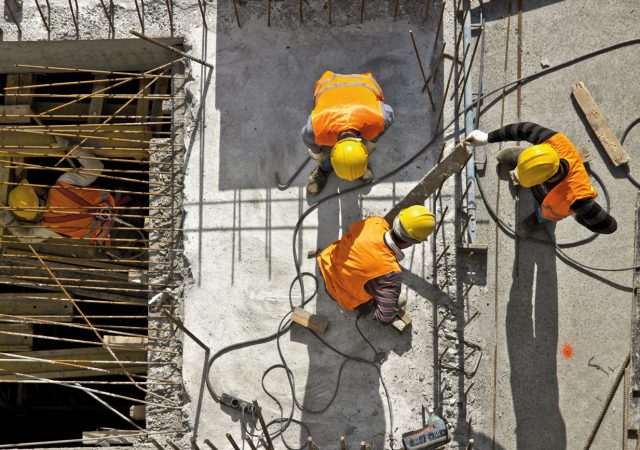 Engineers installing cable.