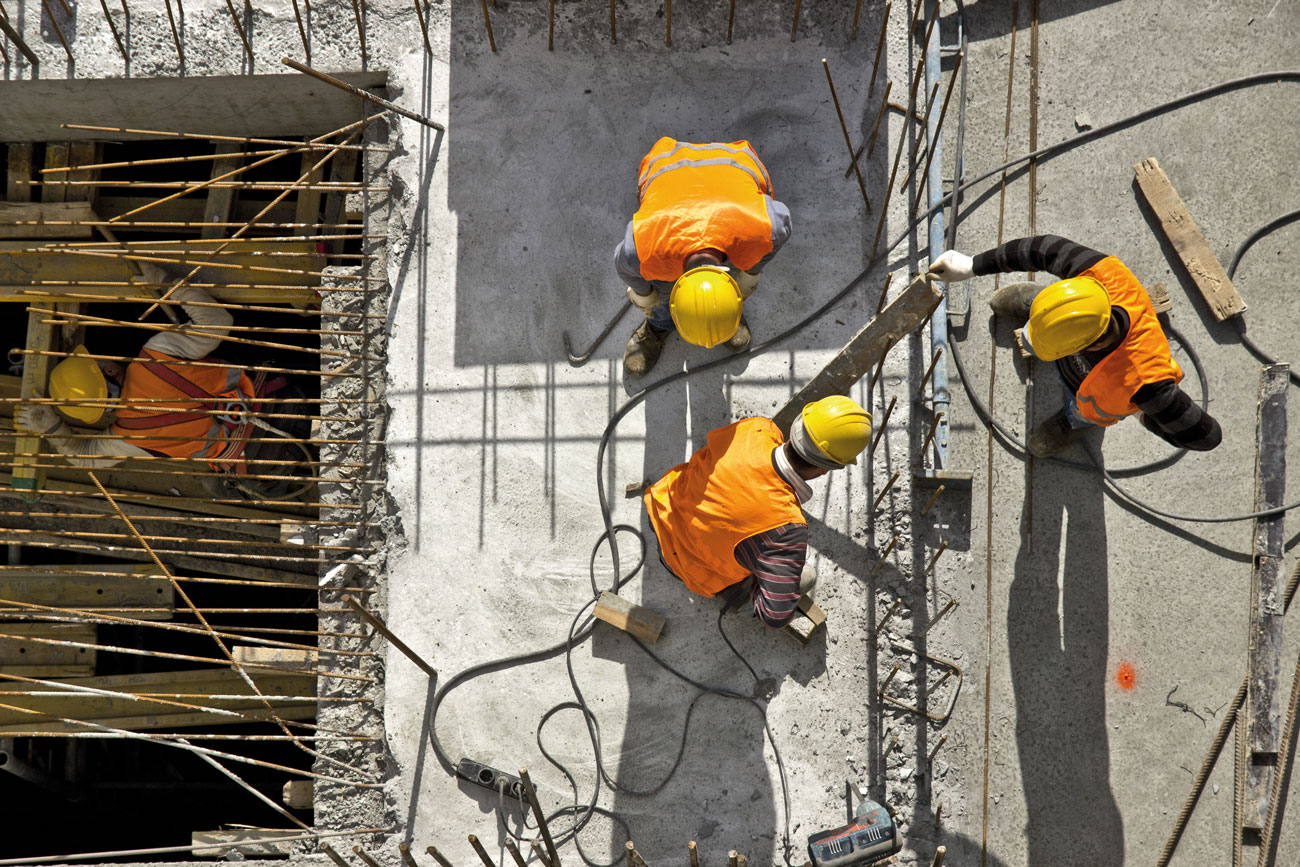 Engineers installing cable.