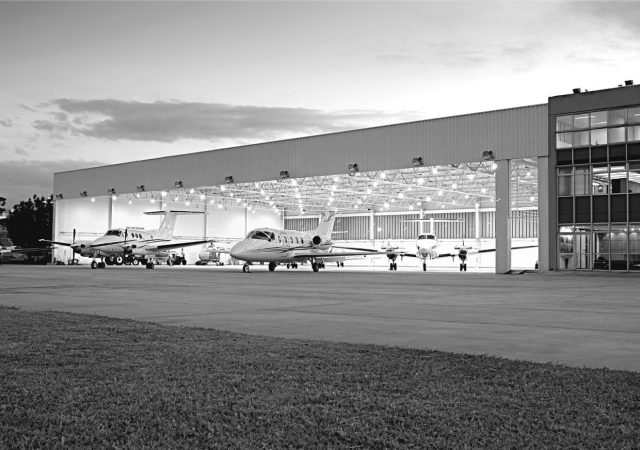 Hangar with small aircraft.