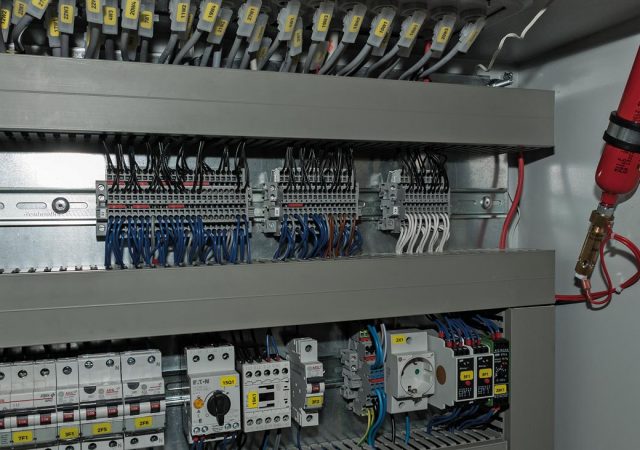 Device-integrated fire protection with AMFE inside electric cabinets detects fires reliably and extinguishes at the point of origin. Signal connections monitor the activation.