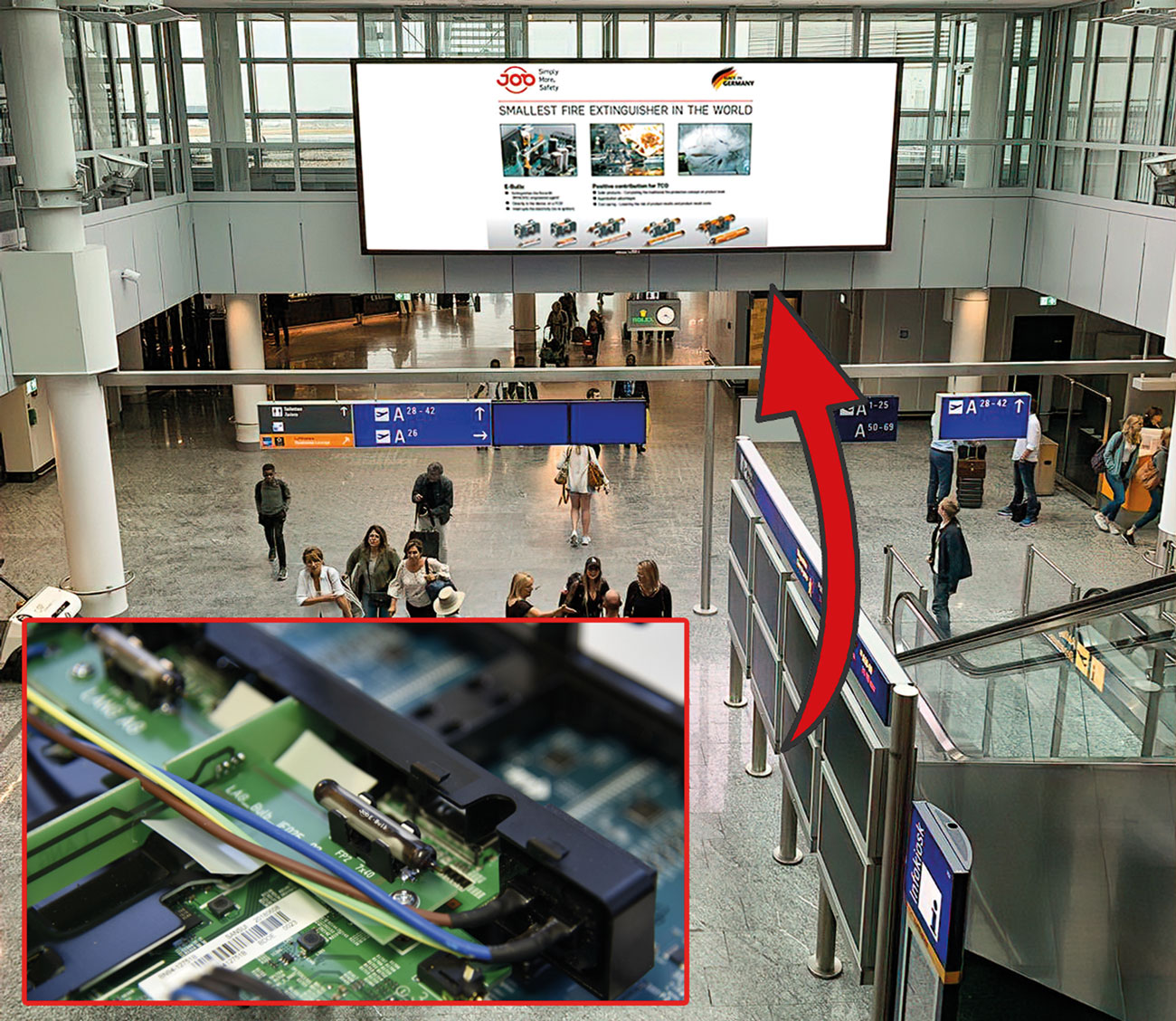 E-Bulb protected LED advertising screen at Frankfurt International Airport for enhanced fire-safety in public spaces.