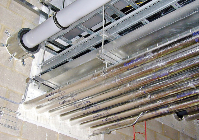 Multiple services within a single aperture. Lower services limit the access to the upper penetration seals.