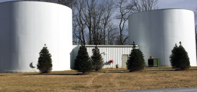 These tanks and their associated fire pump house provide the required fire flow for a remote industrial site.