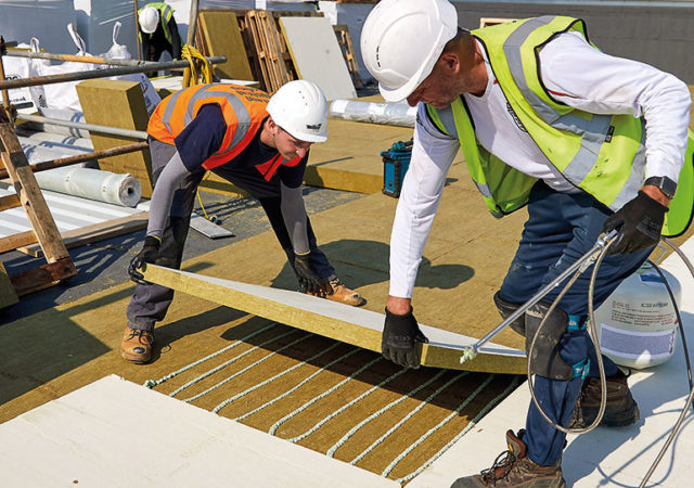 Southern Industrial Roofing installs non-combustible stone wool insulation at Cobham Free School, Surrey.