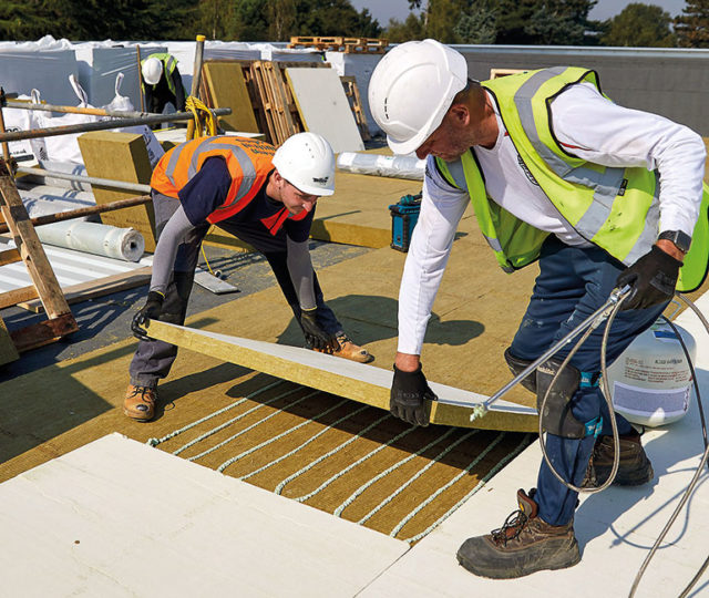 Southern Industrial Roofing installs non-combustible stone wool insulation at Cobham Free School, Surrey.