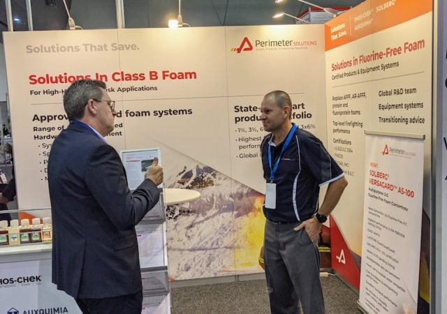 David Phoenix (R) talking to a client on the Perimeter Solutions booth at the AOG Show. (Image copyright: Perimeter Solutions)