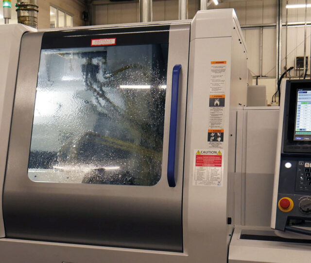 A busy Citizen M32 machine making some of the components that will go on to produce the nozzles.