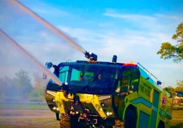 An ARFF (Aircraft Rescue & Firefighting) vehicle shown in action. (Photo by William Greenwood)