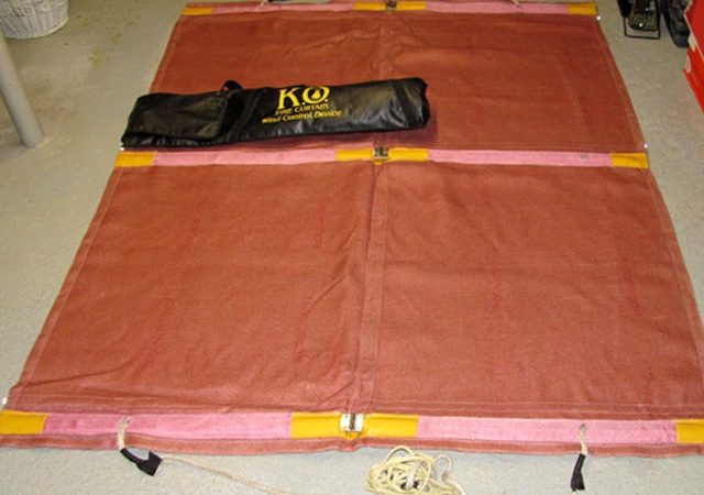 The 'F' Type fire curtain unrolled with bag. (K.O. Fire Curtain)