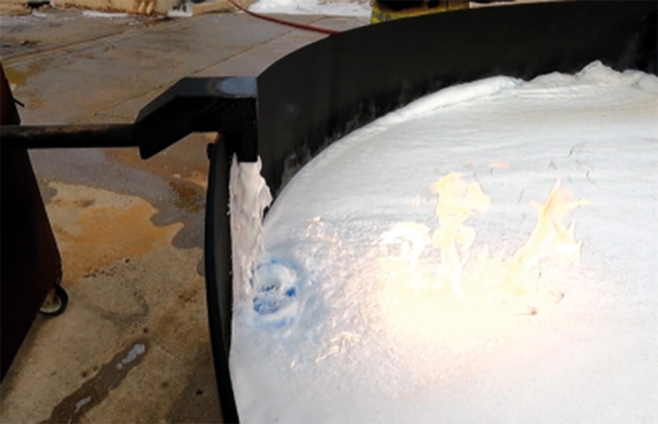 Figure 6. The forceful pourer clearly showing foam blanket exposure penetration and fuel exposure, with fuel pick-up causing continuing burning on the foam surface in front of the impact point. Images supplied by Author / Contributor
