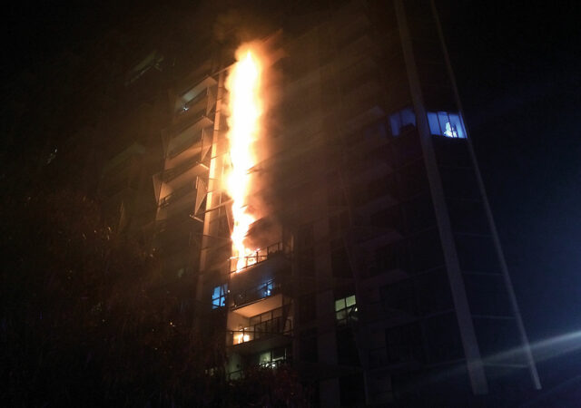 Image 1: Fire in the Lacrosse apartment block in Melbourne showing the rapid flame movement along the vertical cladding. Image courtesy of Fire Rescue Victoria, Australia Images supplied by Author / Contributor